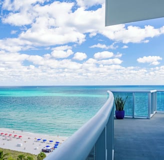 a balcony with a view of the ocean Andaz Miami Hotel