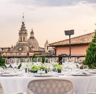a table with a table setting with a view of a city