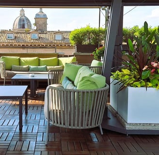 a patio with a couch and a table