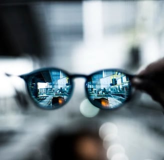 glasses showing a city in the lens