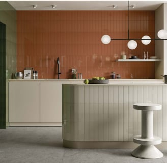 a kitchen with a counter top and a bar stool