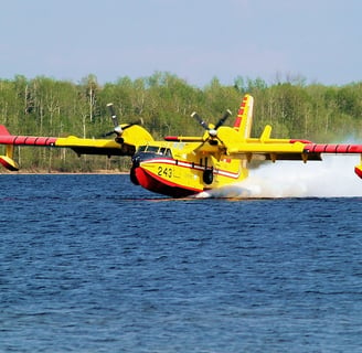 Super Scooper from Quebec skimming across a lake