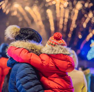Father holding child enjoying Ballarat Winter Festival 2025 – family moment near winter lights