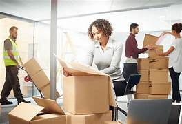 Office moving staff packing and moving boxes in Sydney Office