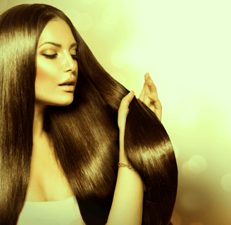 a woman with long hair and a white dress