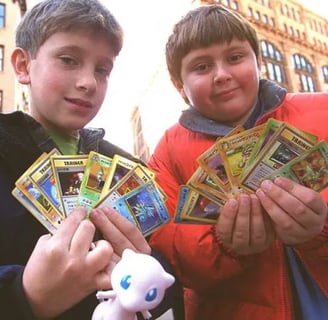 two boys holding pokemon go - go - go - go - go - go -