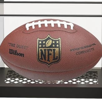 a football ball in a case with a football ball