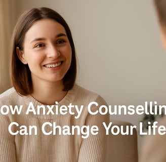 Smiling woman in a cream sweater during a counselling session. Text reads How Anxiety Counselling Can Change Your Life.