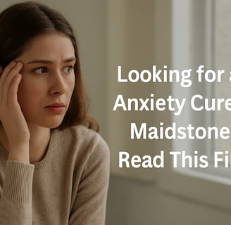 Concerned woman sits by a window in soft light. Text reads: Looking for an Anxiety Cure in Maidstone? Read This First.