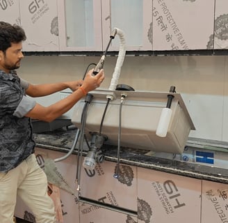 Multifunctional kitchen sink installation by plumbing expert