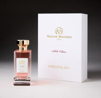 a bottle of perfume with a box of perfume