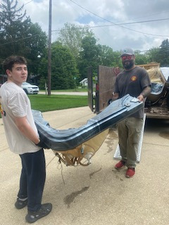 TWO RAMS JUNK REMOVAL CARRYINGA HOT-TUB FOR A HOT-TUB REMOVAL IN SUNBURY OHIO