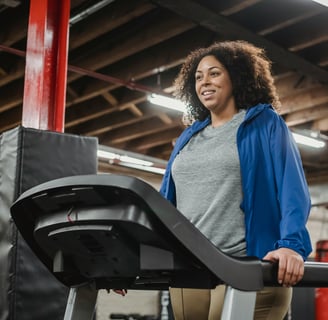 a woman in a gym outfit is standing on a treadmill