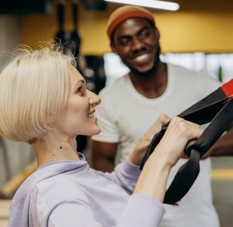 a woman in a white shirt exercising