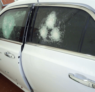 Armored Glass with Bullet Impacts – Bulletproof Vehicle Security