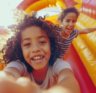 Kids playing in bouce house