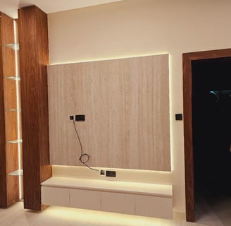 a room with a tv and a wall mounted with a tv