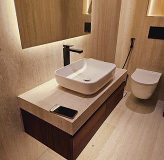 a bathroom with a sink and a phone