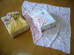 wrapping gift with baby blanket