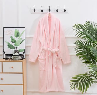 pink terry cloth bath robe hanging