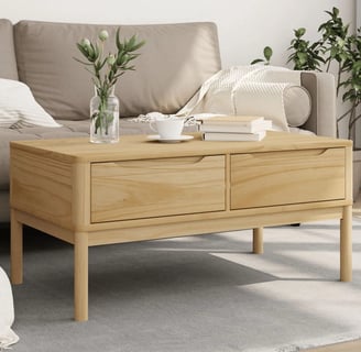 pine coffee table with cream colored couch