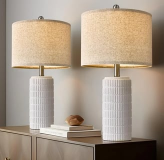 two white base and cream colored lamp shade