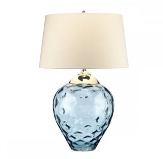 blue glass lamp base with cream lamp shade