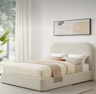 cream queen bed frame with natural light bedroom