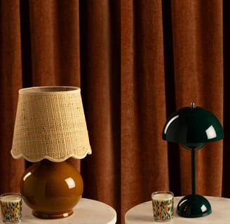 brown and green table lamp one lamp has a linen shade and the other lamp is green