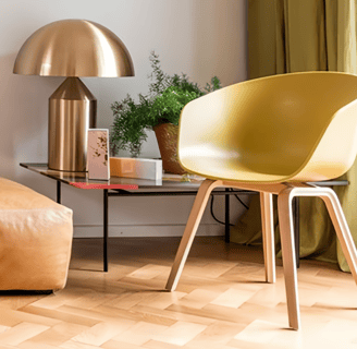 mid century living room with gold lamp and yellow accent chair