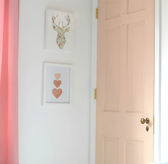 peach bedroom door with gold hardware