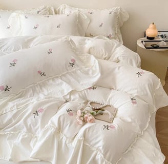 white floral ruffled comforter