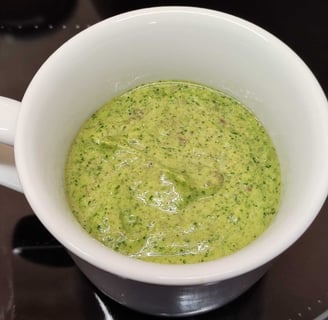 a cup of sauce mojo verde canario