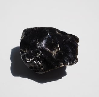 obsidian rock with a black stone on it from Tenerife