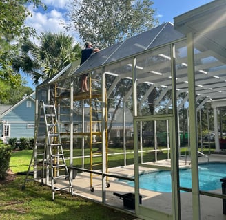 Rescreening a pool enclosures in Murrells Inlet, SC.