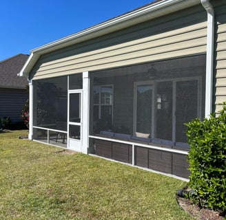 Aluminum screen system installed on a porch in Myrtle Beach, providing a sleek and durable solution.