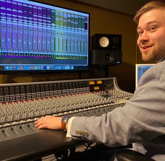 Andrew Wimple focusing on recording