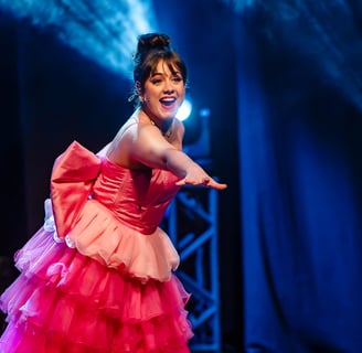 a woman in a pink dress with a pink dress