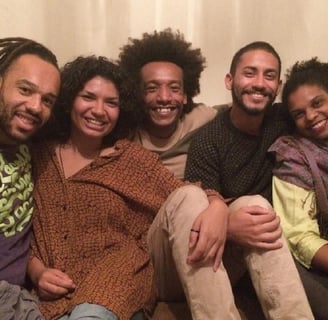 a group of people sitting on a couch