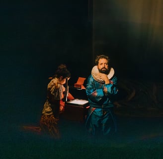 a man in a blue robe is holding a mirror