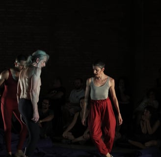 a man and woman performing a dance routine