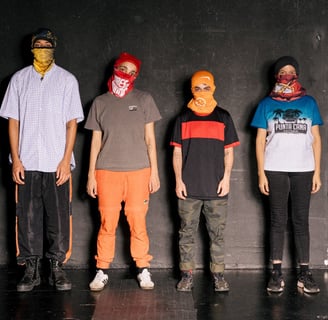 a group of people wearing masks and masks