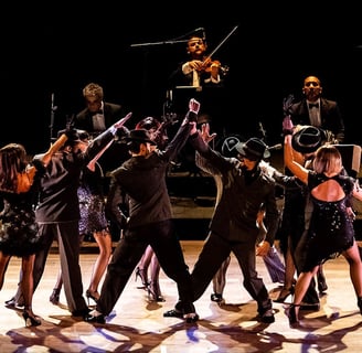 a group of dancers performing a dance routine