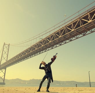 a man is flying a kite in the sand