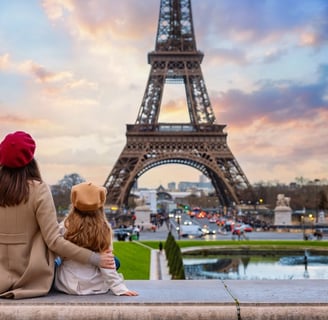 A breathtaking view of Paris featuring the iconic Eiffel Tower standing majestically against the bac