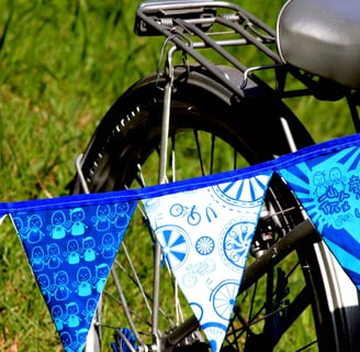 a bicycle with a blue banner on it