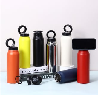 a variety of different colored bottles of water
