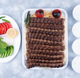 a plate of meat and vegetables on a table