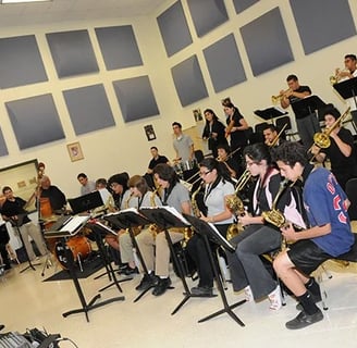 Maestro Bobby Ramirez leading the Big Band orchestra jazz education