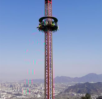 a ferris Rotating tower at a amusement park